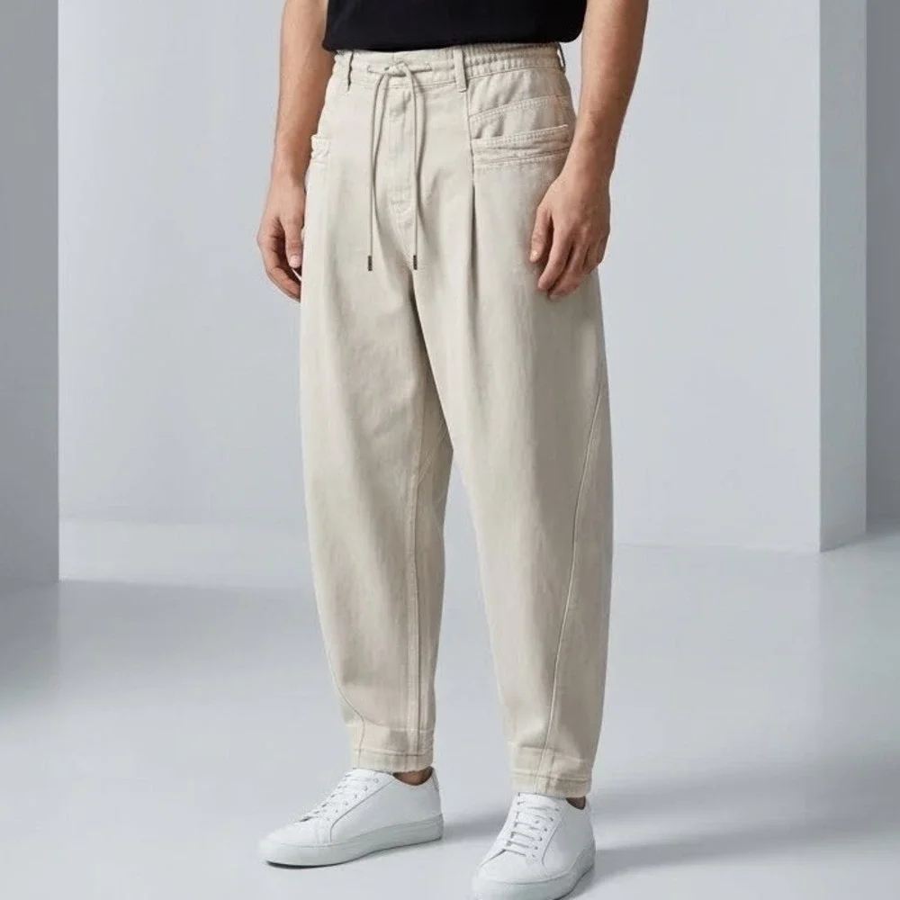 Songzio Homme Beige Pleated Balloon Pants Men 44 Tapered Denim unique streetwear